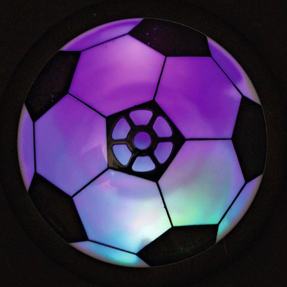 Glijdende voetbal met licht