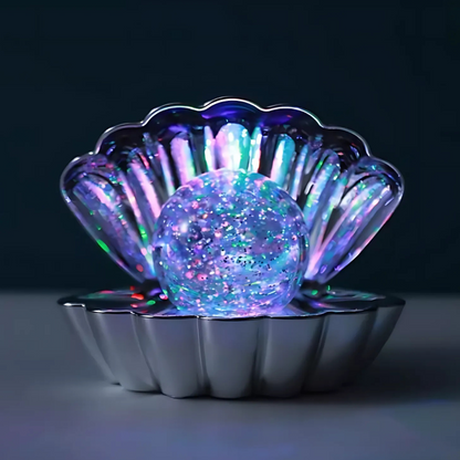 Schelpvormige lamp met parel