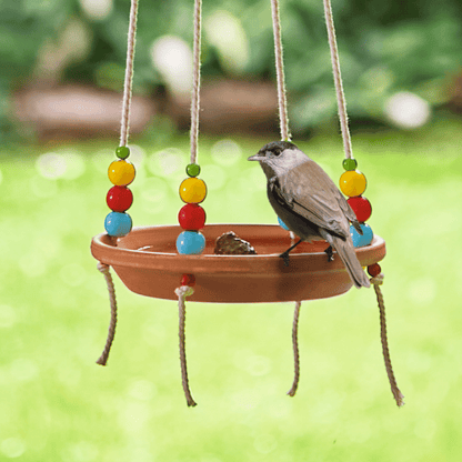 Hang drinkschaaltje voor vogels